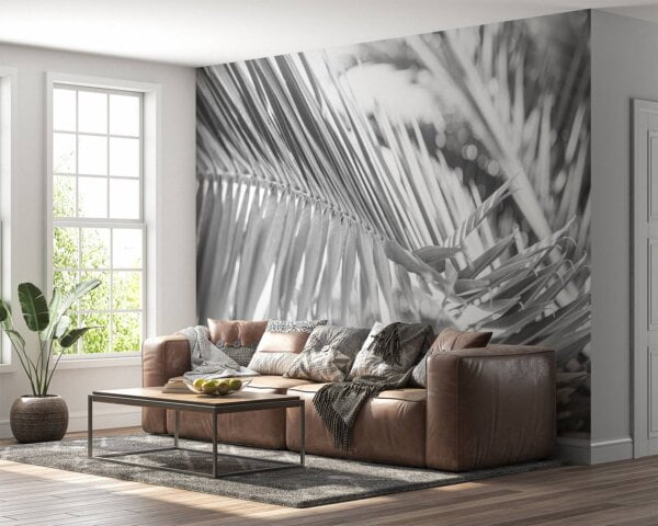 Tropical palm tree design on bedroom wallpaper.