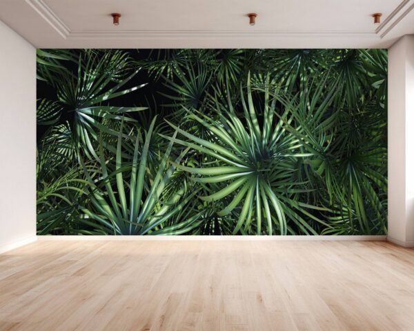 Close-up of detailed tropical palm leaves patterns on wallpaper.